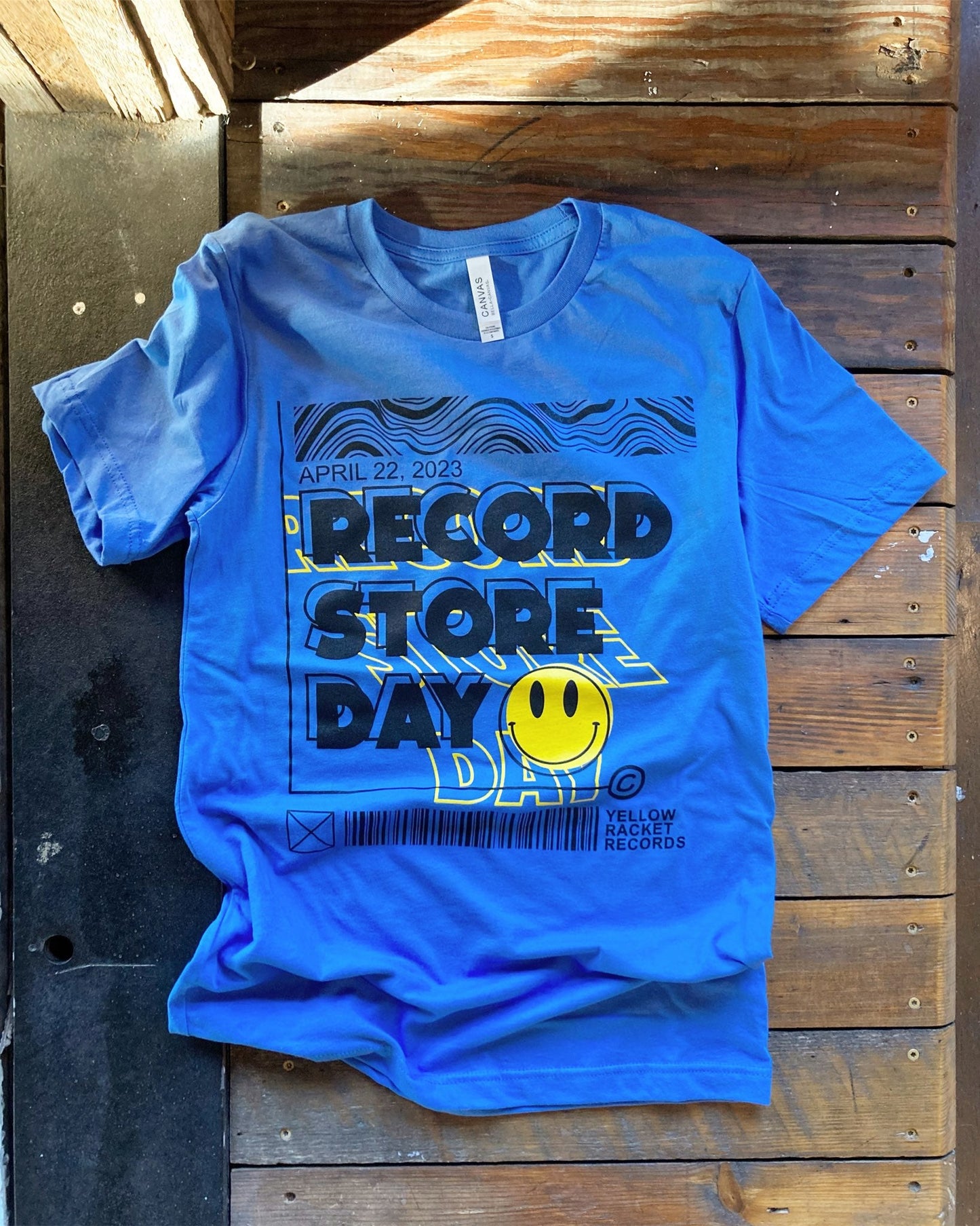 Smiley Face T-Shirt (Blue/Black/Yellow) - Record Store Day 2023 - Smiley Face T-Shirt (Blue/Black/Yellow) - Record Store Day 2023 - L - Apparel - Yellow Racket Records